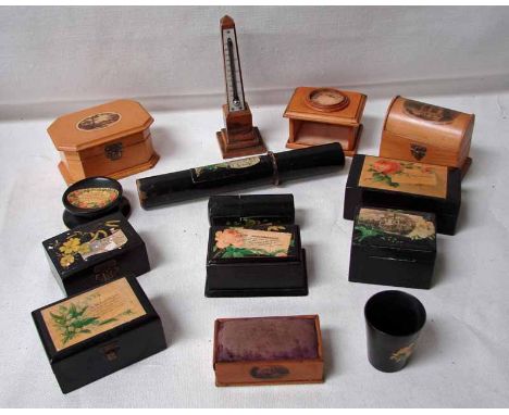 A collection of Victorian decoupage black lacquer ware including a needle case a shot glass and various boxes, three pieces o