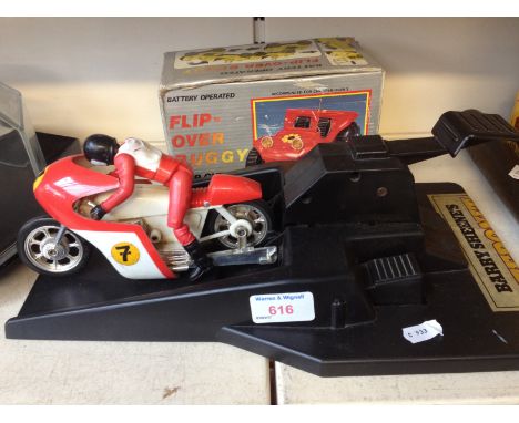 A BARRY SHEEN STEP ON IT TOY AND A BUGGY      F4