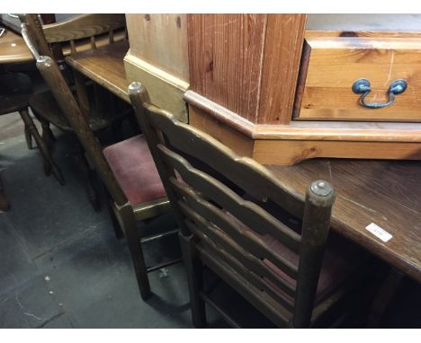 A REFECTORY TABLE AND LADDER BACK CHAIRS