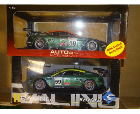 A PAIR OF 1:18 SCALE DIECAST MODEL RACING CARS both ASTON MARTIN DBR9 24H LE MANS RACING CARS, one by AUTOart and one by SOLI