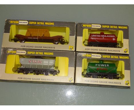 OO GAUGE: WRENN  RAILWAYS: A GROUP OF RARER WAGONS TO INCLUDE: W5077 UNITED MOLASSES TANK WAGON, W5076 POWER ETHYL PETROL WAG