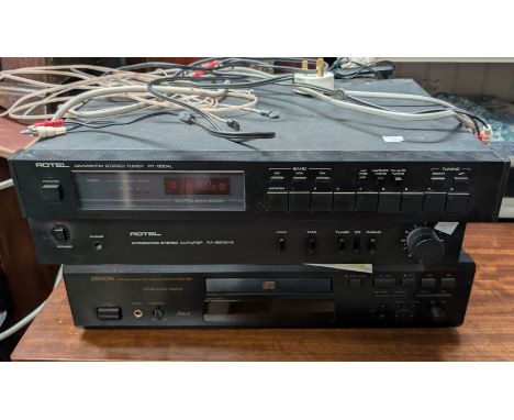 A Denon CD player, Rotel amp and tuner and a pair of Celestion speakers on stand