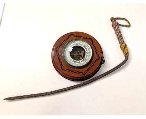 A 19th century beadwork riding crop and a barometer.