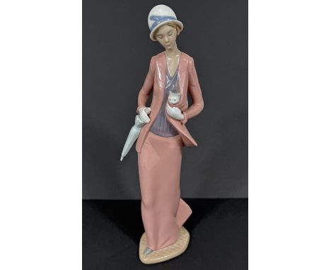 A Nao figure of a 1920's lady with cat (boxed)