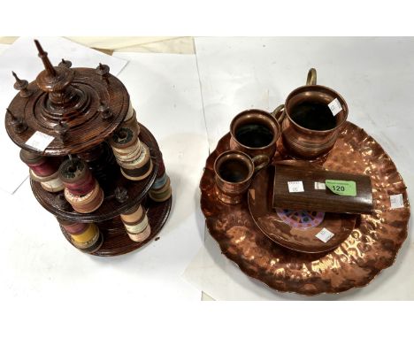 A 19th century rosewood cased sewing set; a 2 tier cotton bobbin stand; a beaten copper tray, 3 mugs etc.