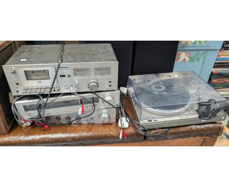 A Panasonic vintage stacking music system with speakers