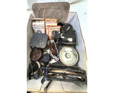 A selection of 9.5mm home movie shorts including Mickey Mouse, Betty Boop home movies etc a Baby movie camera and a projector