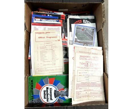A collection of 1950's onwards Manchester United programmes, Token sheets etc including cup matches etc