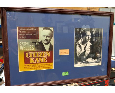 A framed pen signature of Orson Wells with images from Citizen Kane