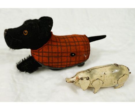 A tin plate Schuco Scottie dog, a tin plate pig and other teddies, etc.