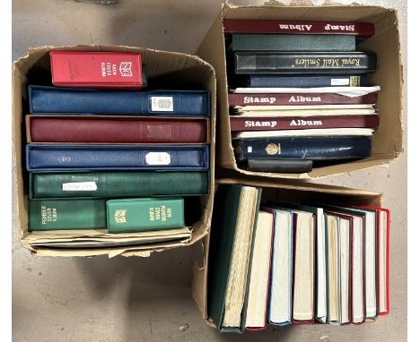 Three boxes of 25 empty stamp and cover albums, some album leaves, up to 64 page.