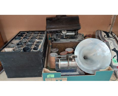 An Edison Gem Phonograph with cylinders and another cylinder player.