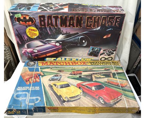A Batman '89 Scalextric set in box and a Matchbox M-2 set.