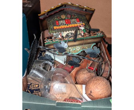 A mid 20th century West German novelty cuckoo clock, a collection of Russian seal badges, other collectables