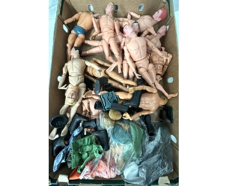 A collection of loose Action Man figures with accessories.