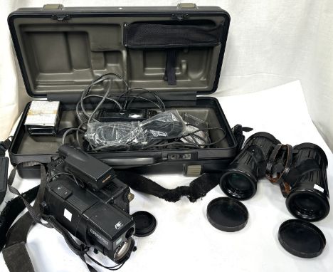 A pair of "Swift" 7 x 50 military style binoculars; a "Sharp" 8 zoom video camera and accessories in box.