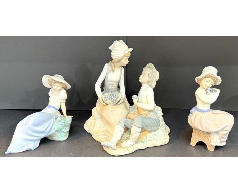 Nao, group of couple with grapes, 23cm high,&nbsp; two other figures