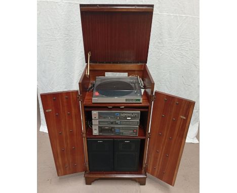 A Sony PS-LX 10 record player, TA-V10 amp and tuner and tape deck in a mahogany stereo cabinet.