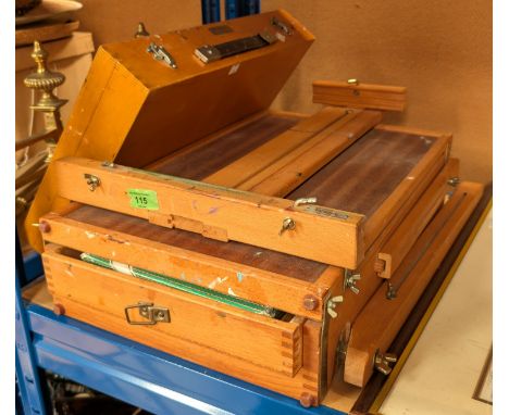 An artist's combined easel &amp; box, a painting box and contents.