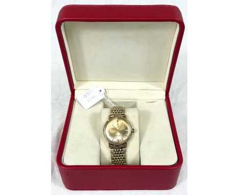 A gents manual Omega centre sweep seconds hand Automatic Seamaster De Ville, gents wrist watch with gold coloured dial, baton