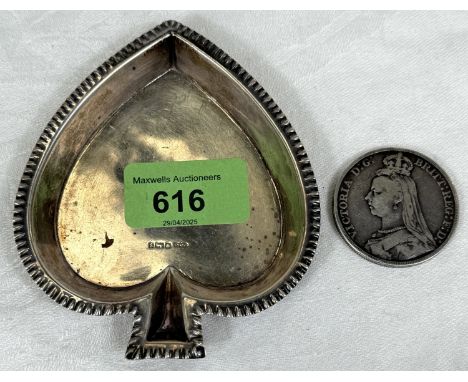 A 'spade' shaped hallmarked silver Bridge ashtray; a Victorian 'bun' crown, 1889.