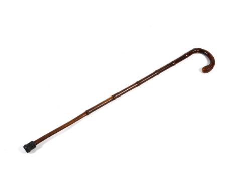 A Victorian silver-mounted equine measuring walking stick, with cane stick, 84 cm high