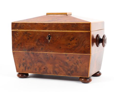 A Georgian burr walnut sarcophagus shaped tea caddy and cover, inlaid with satinwood stringing, the interior fitted with two 