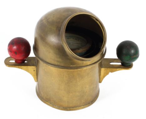 A vintage brass ships binnacle compass, the water-filled dial flanked by two coloured balls, with domed cover, approx. 40 cm 