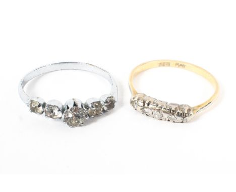 An 18ct gold and platinum illusion set diamond ring together with a paste set ring. Size 0. 