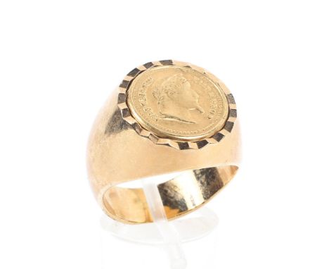 An unmarked yellow metal gentleman's coin signet ring set with Napoleon III 20 Franc coin. Size T, 14.6g