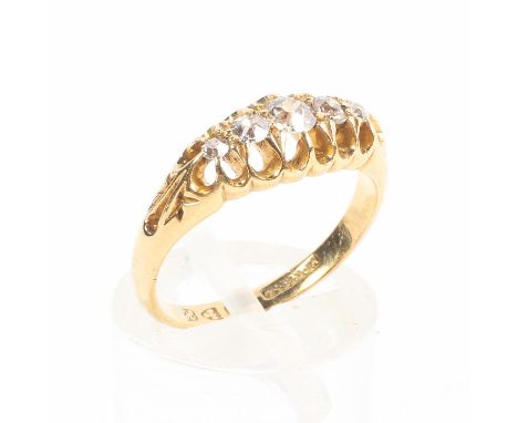 An 18ct gold and diamond five stone ring set with graduated line of old brilliant cut diamonds. Size J, 3.0g. 