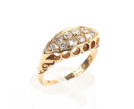 An 18ct gold and diamond ring set with double line of single cut diamonds, 3.7g. Size L. 