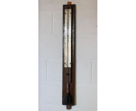 A Short &amp; Mason stick barometer, early 20th century, with silvered dial, on oak wall mount, 102 cm high overall 