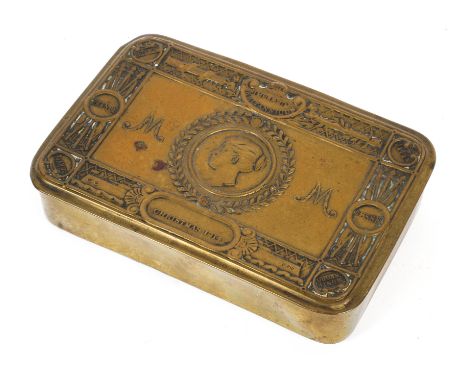A World War I Princess Mary 'Gift Fund' tobacco brass tin, with original contents and presentation card, embossed with a port