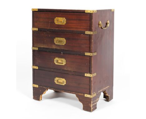 A mahogany and brass bound four drawer campaign chest with brass side handles, 20th century, on ogee bracket feet,  62.5 cm h