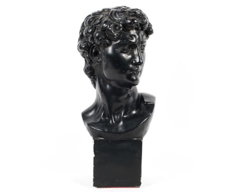 A large plaster portrait bust of David, 20th century, painted in black, incised 983 to reverse, on integral square plinth, 58