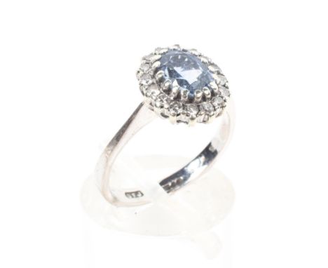 An 18ct white gold sapphire and diamond dress ring, Size J, 1.2g. 