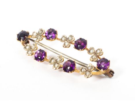 A 9ct gold amethyst and seed pearl brooch. 2.5g. 