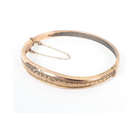 A 9ct gold hinged bangle, 7.1 grams