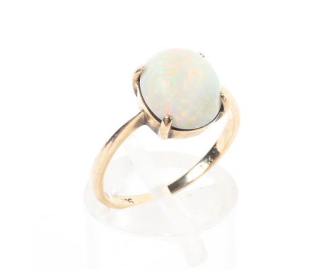 A 9ct gold and opal ring set with single oval cabochon cut opal 1.9g. Size L. 