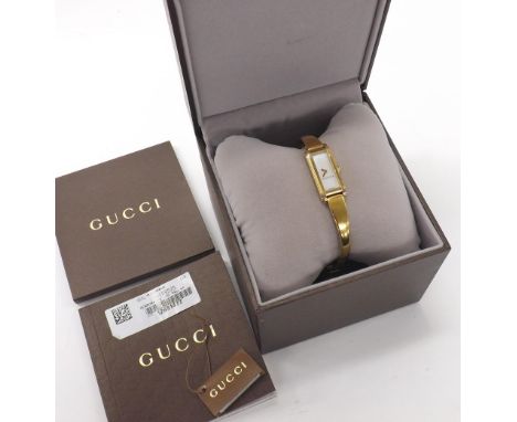 Gucci gold plated lady's bangle watch, ref. 109, mother of pearl dial, quartz, 14mm (M81Q9X) *Gucci box, warranty and mainten