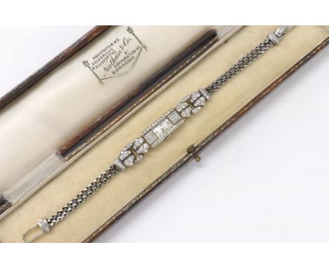 Fine quality Art Deco platinum and diamond lady's cocktail watch, rectangular silvered dial with Arabic numerals, cal. 5820 1