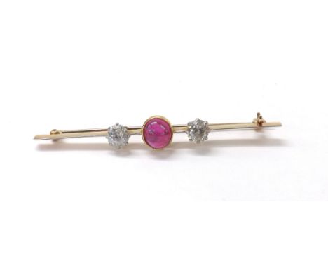 Cabouchon ruby and old-cut diamond bar brooch, the oval ruby 1.42ct approx, flanked by two round old-cut diamonds, estimated 