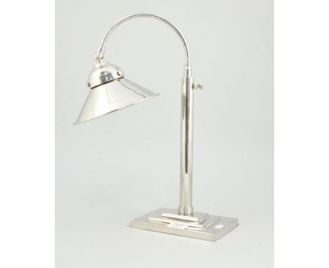 A silver plated desk lamp