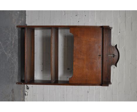 Arts and Crafts style oak slim line bureau bookcase, top with a three quarter gallery, fall front surface above an open fixed