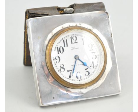 Silver faced travelling clock, London 1924, white enamel dial, lever movement