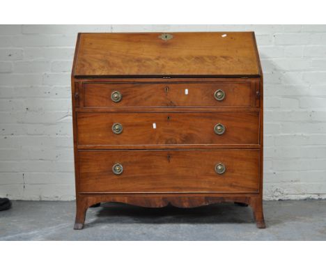 George III mahogany bureau, fall front enclosing a fitted interior, with cupboard, drawers and pigeon holes, three long gradu