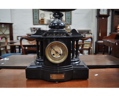 Victorian black slate mantel clock, architectural form, circular dial, French cylinder movement, indistinctly signed, strikin