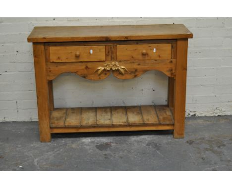 Modern pine side table, two frieze drawers, shelf under, width 110cms.