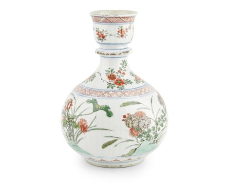 FAMILLE VERTE HOOKAH BASEKANGXI PERIOD the globular body rising to a cup-shaped mouth, painted with prunus, chrysanthemum, pe